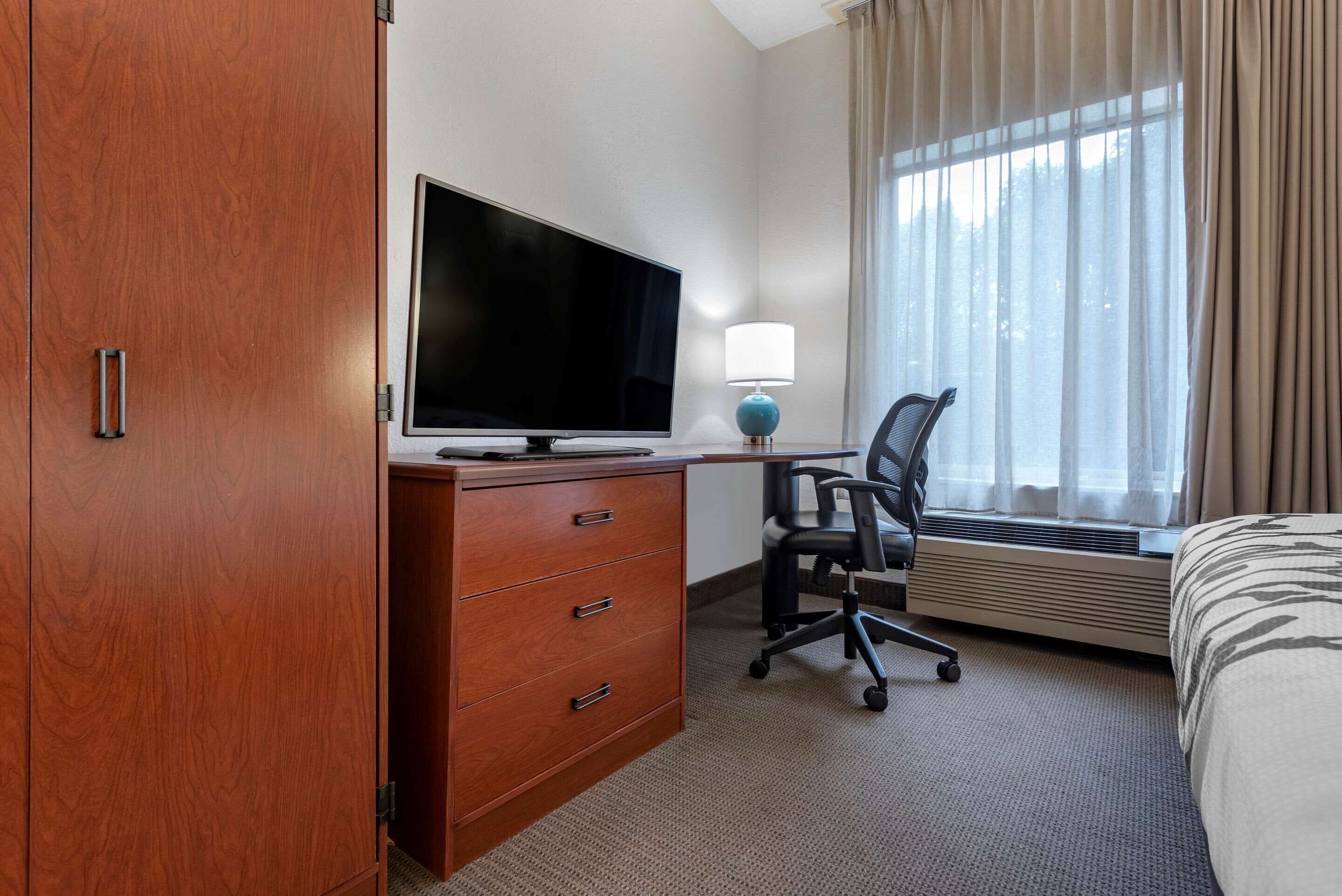 desk, blackout curtains, iron/ironing board, free cots/infant beds