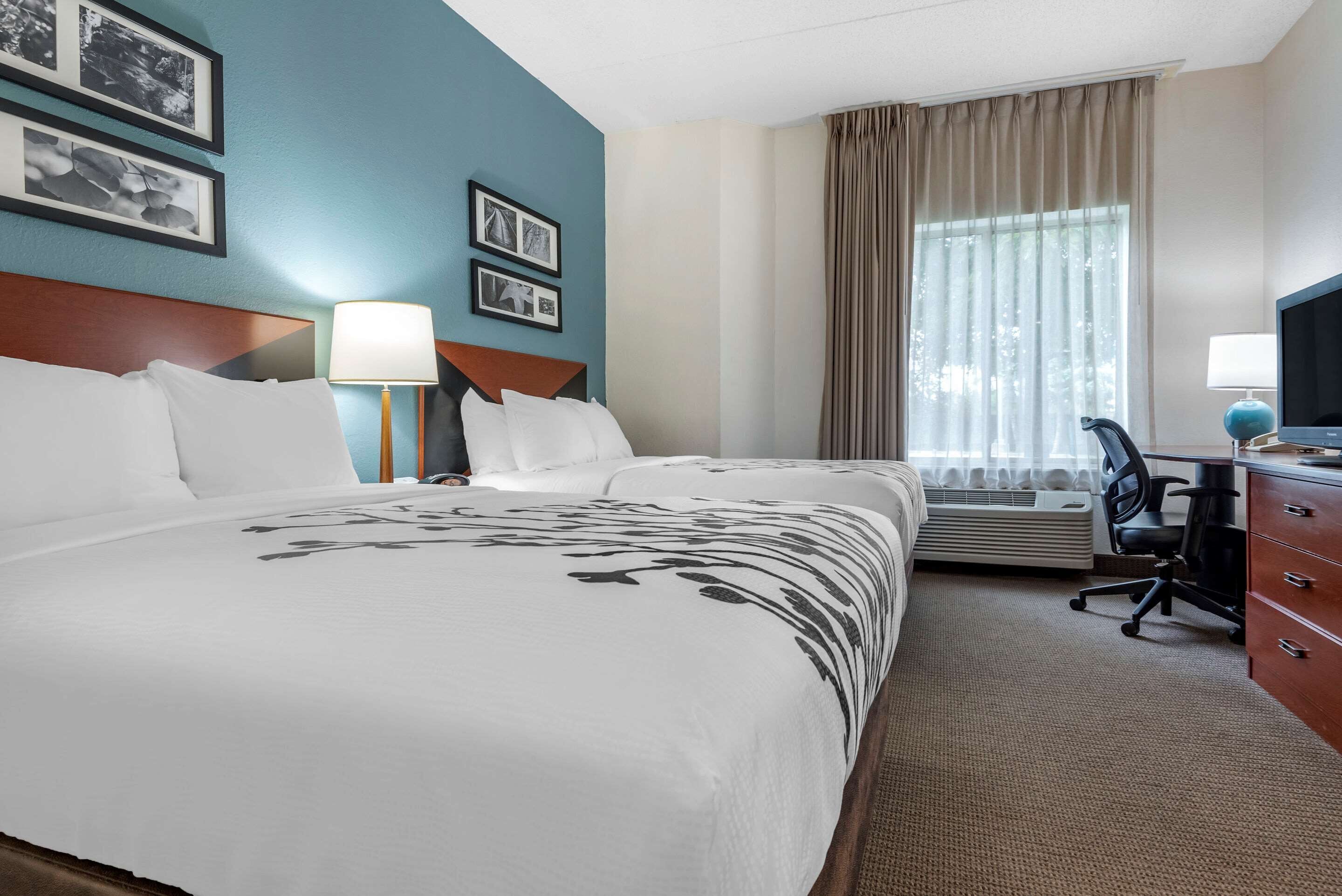 desk, blackout curtains, iron/ironing board, free cots/infant beds