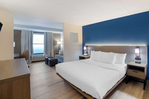 Suite, 1 King Bed, Non Smoking | Desk, blackout drapes, iron/ironing board, cribs (free)