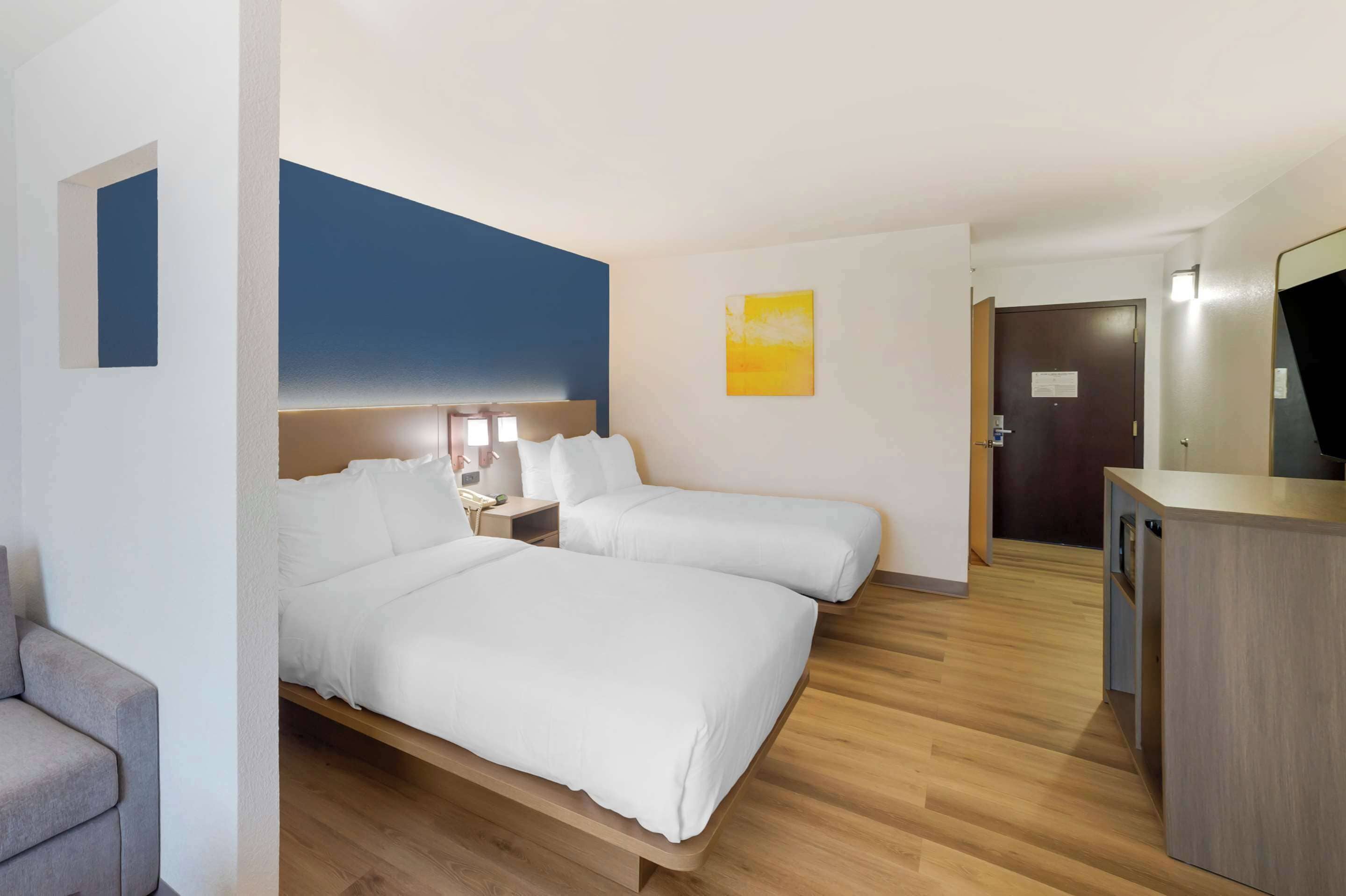 desk, blackout curtains, iron/ironing board, free cots/infant beds