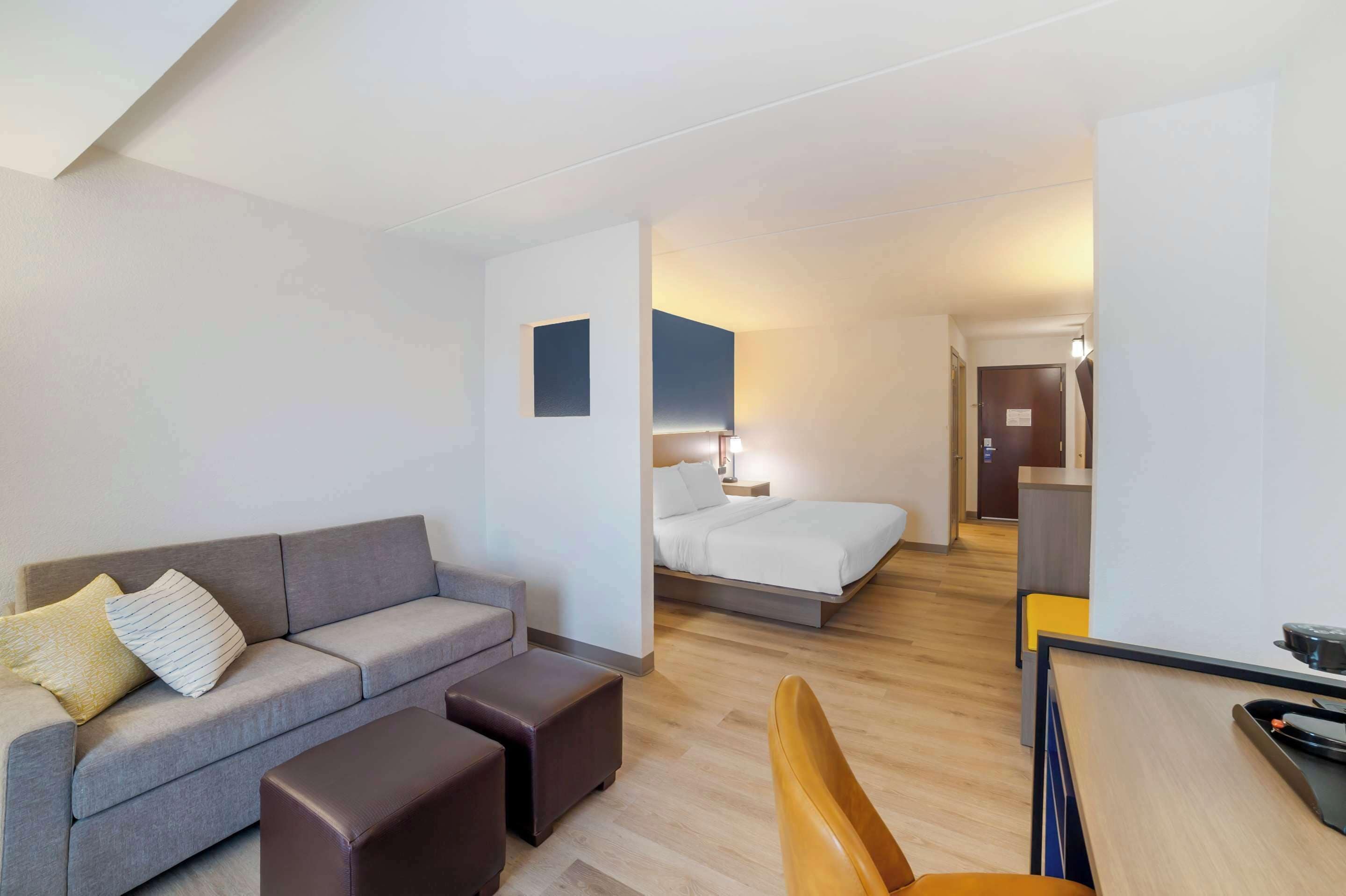 suite, 1 king bed, non smoking | desk, blackout curtains, iron/ironing board, free cots/infant beds