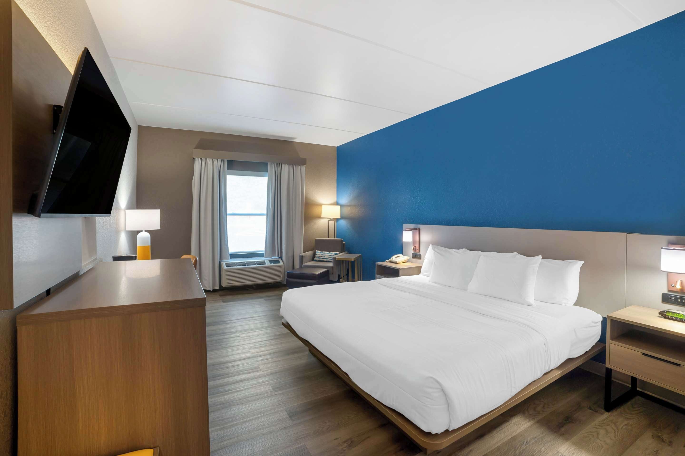 desk, blackout curtains, iron/ironing board, free cots/infant beds