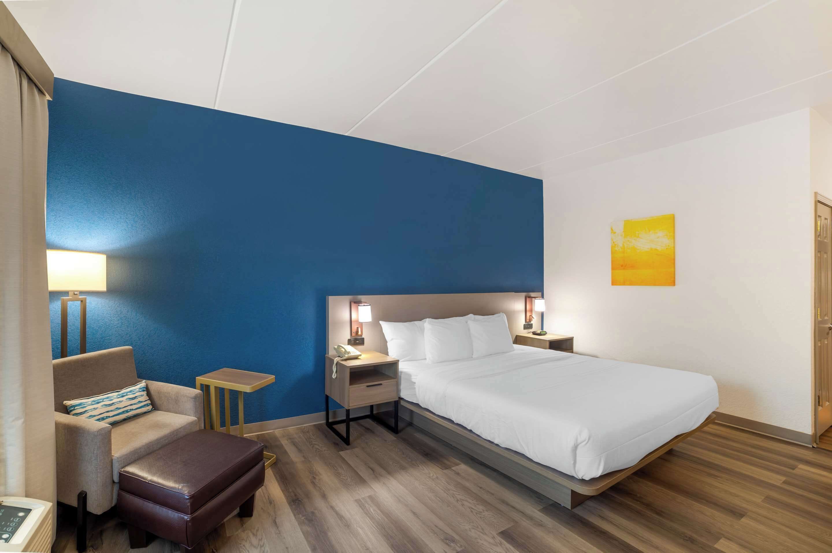 desk, blackout curtains, iron/ironing board, free cots/infant beds