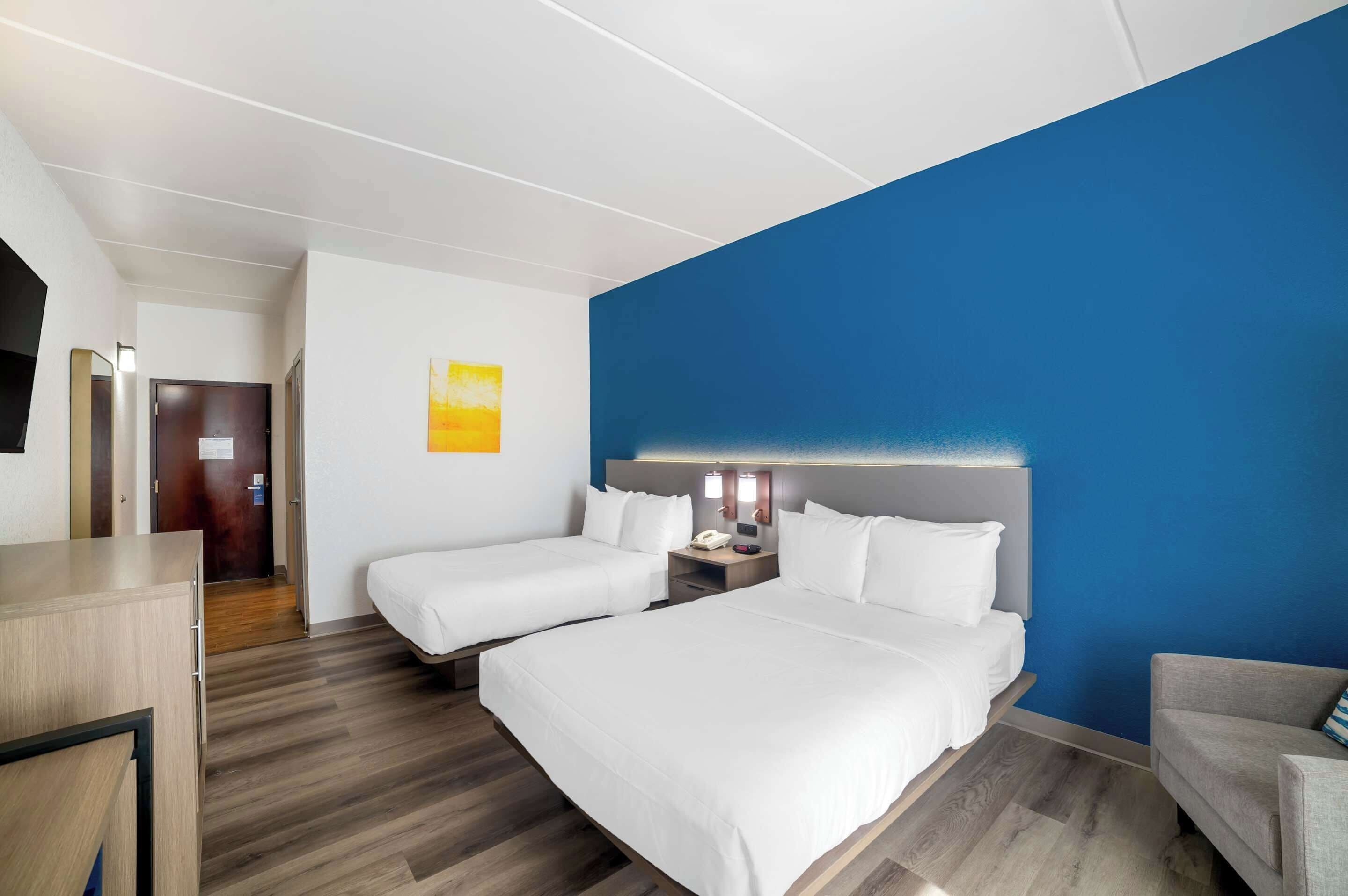 desk, blackout curtains, iron/ironing board, free cots/infant beds