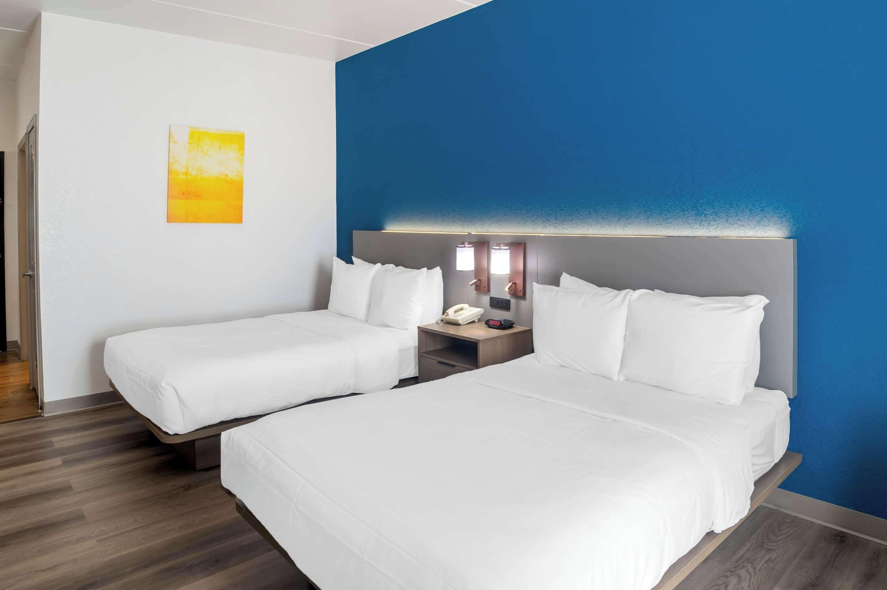 desk, blackout curtains, iron/ironing board, free cots/infant beds