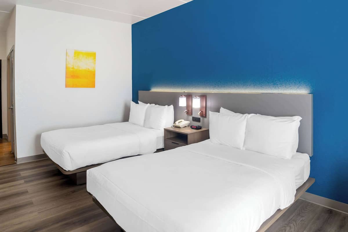 desk, blackout curtains, iron/ironing board, free cots/infant beds