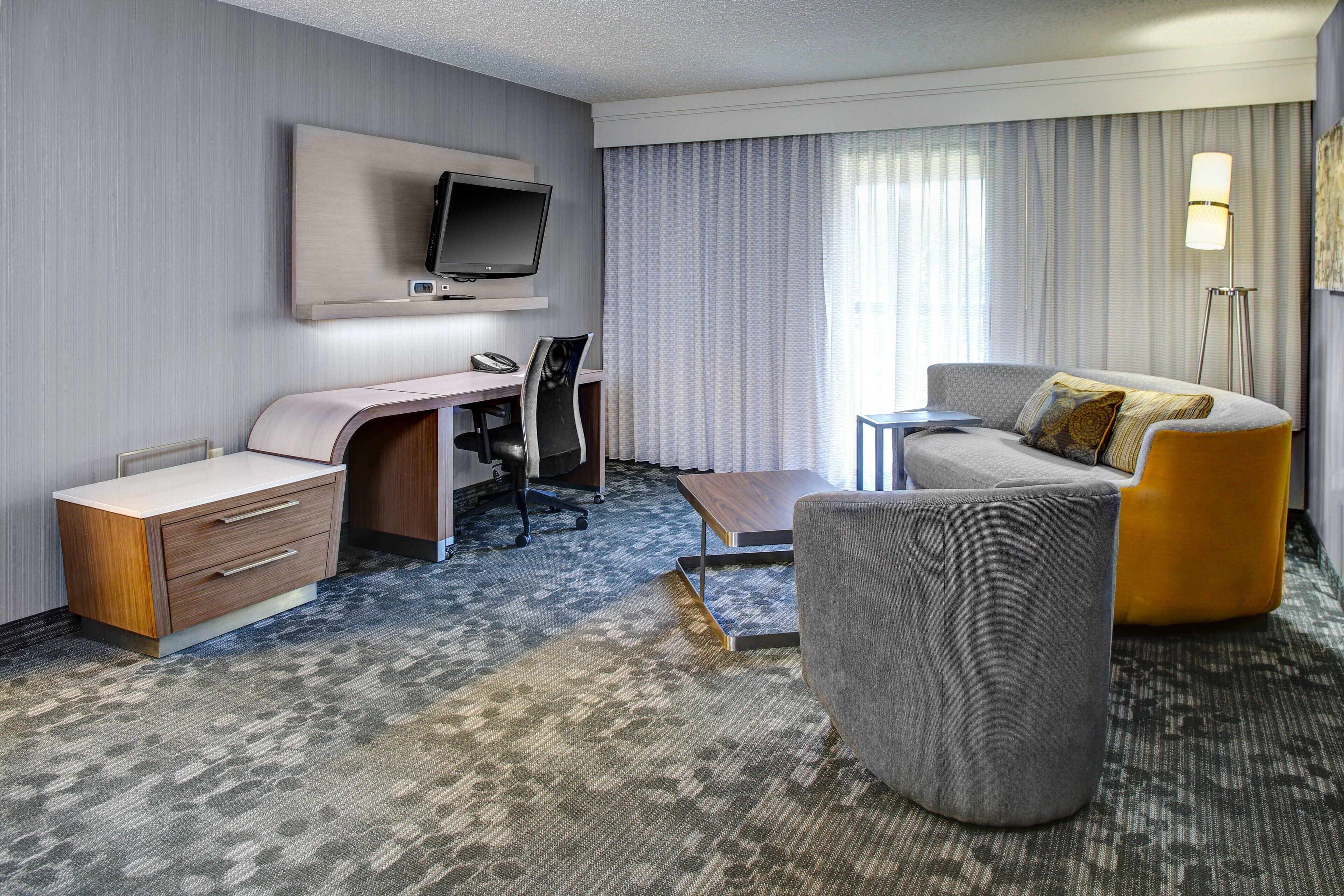 suite, 1 bedroom, non smoking | desk, blackout curtains, iron/ironing board, free cots/infant beds