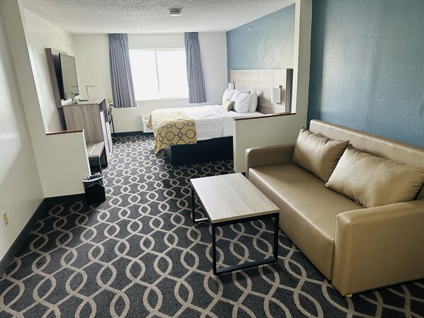 Studio Suite, 1 King Bed, Non Smoking | Desk, laptop workspace, iron/ironing board, free cots/infant beds