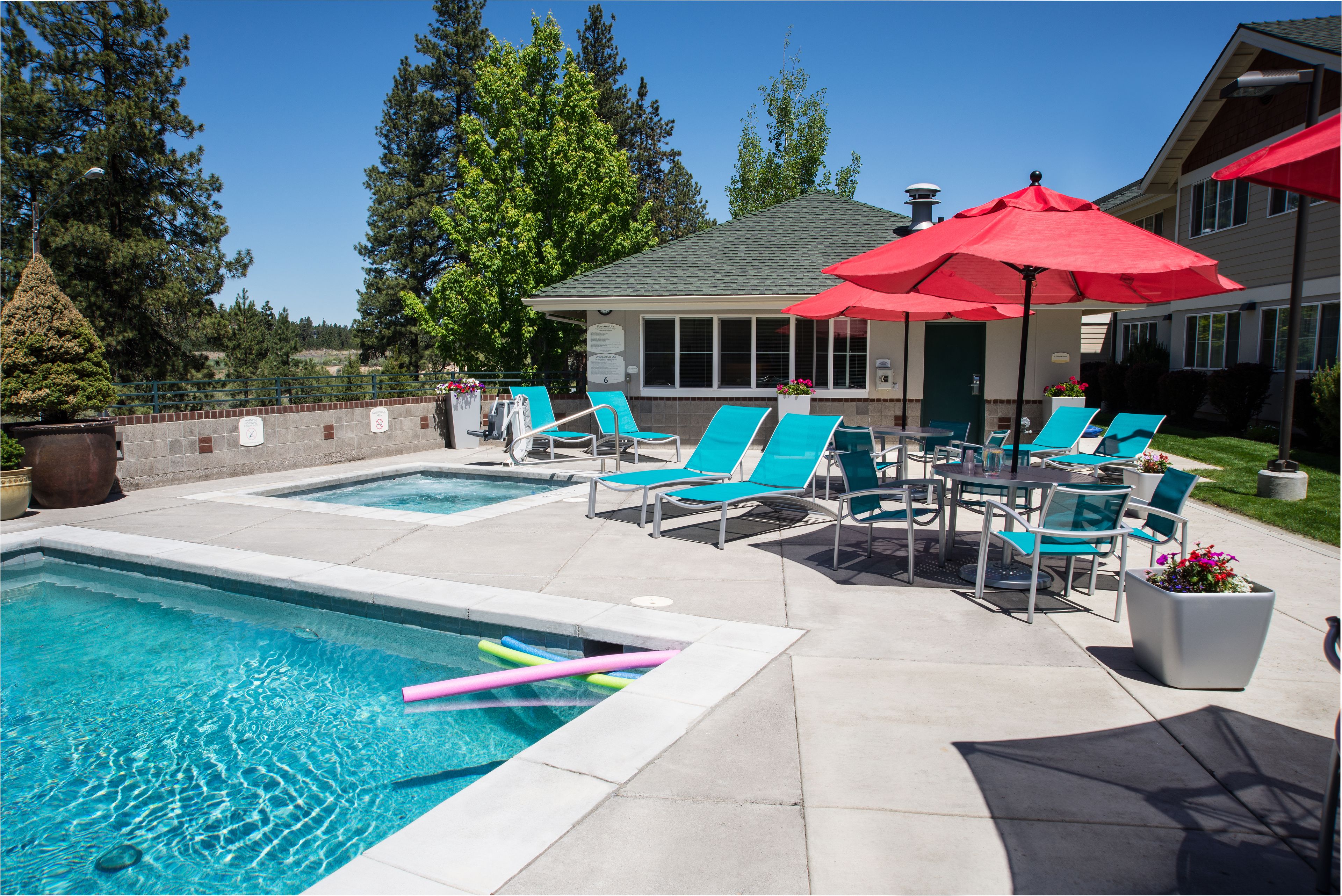 seasonal outdoor pool, open 8:00 am to 10:00 pm, pool umbrellas
