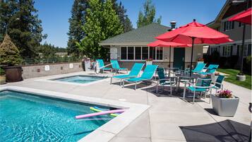 Seasonal outdoor pool, open 8:00 AM to 10:00 PM, pool umbrellas
