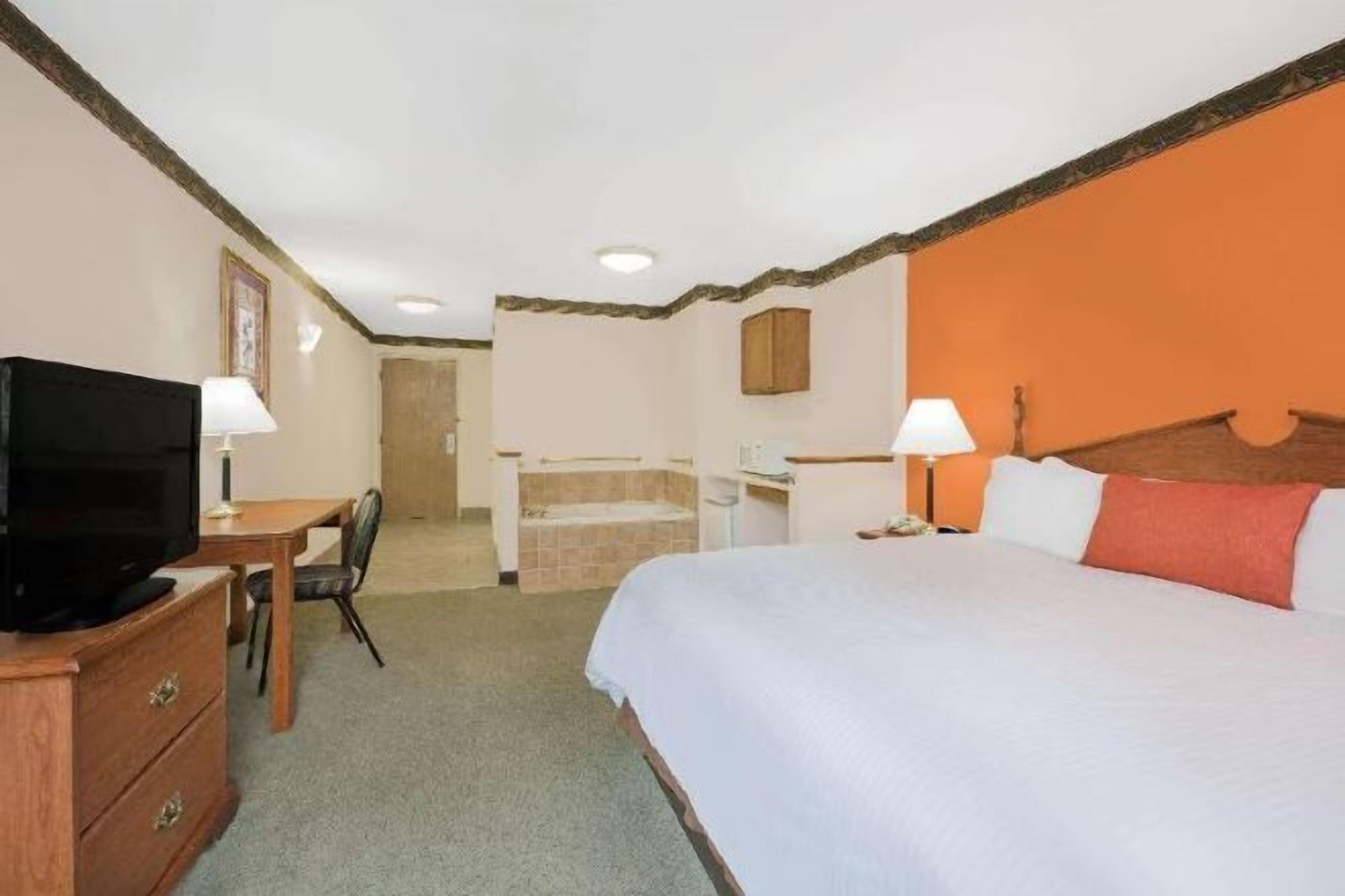 Desk, blackout curtains, iron/ironing board, free cots/infant beds