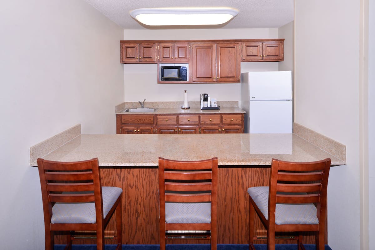 Suite, 1 Bedroom | Desk, blackout curtains, iron/ironing board, free WiFi