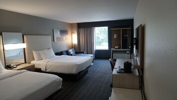 Premium bedding, desk, laptop workspace, iron/ironing board