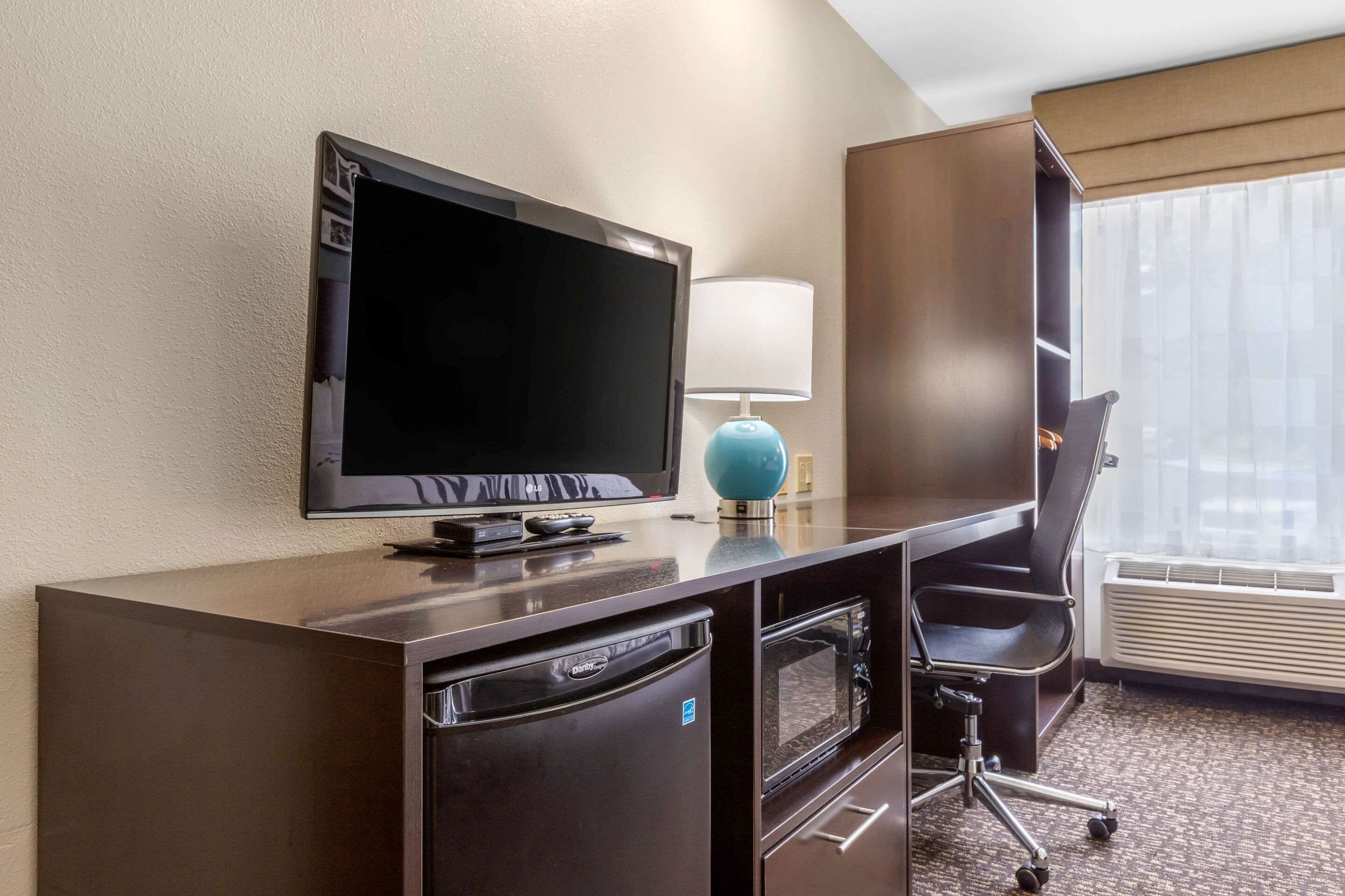 desk, laptop workspace, iron/ironing board, free cots/infant beds