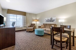 Suite, 1 King Bed, Non Smoking | Desk, laptop workspace, iron/ironing board, free WiFi