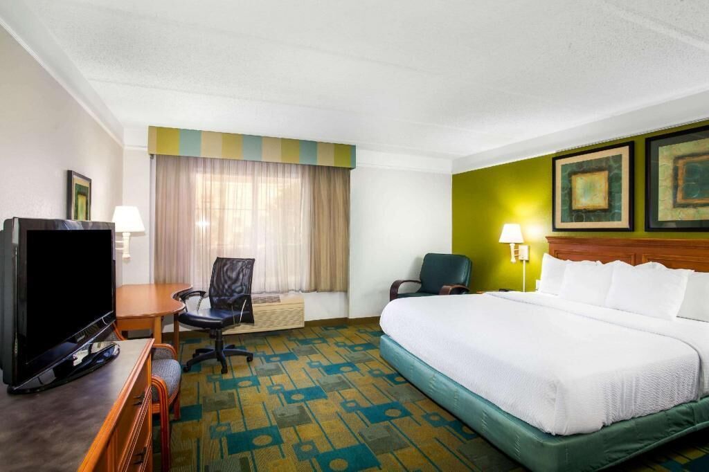 Pillow-top beds, desk, blackout curtains, iron/ironing board