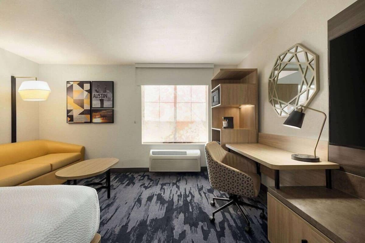 Pillow-top beds, desk, blackout curtains, iron/ironing board