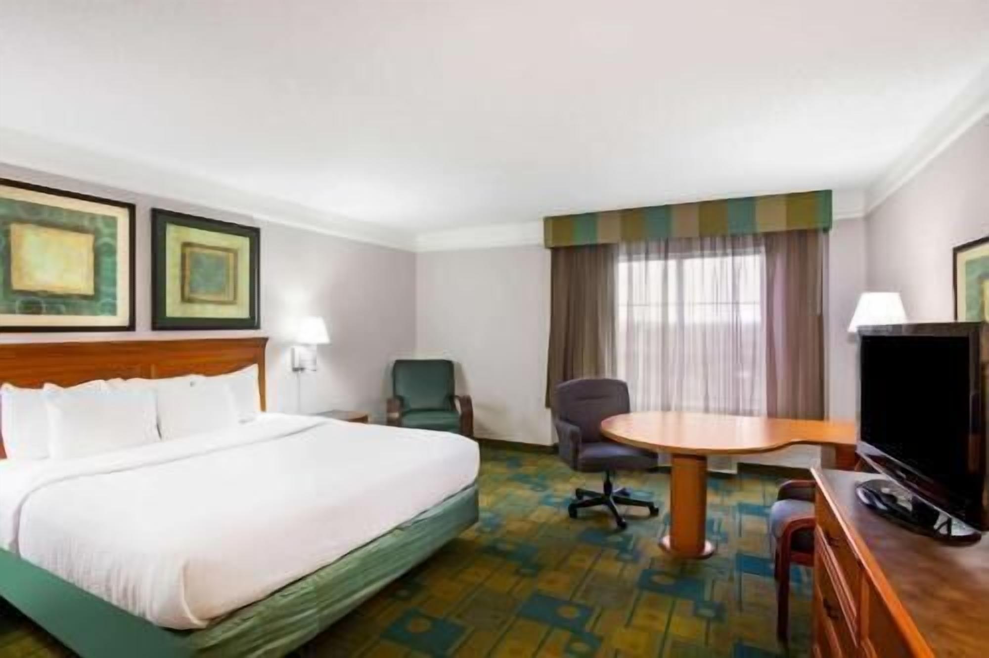 Pillow-top beds, desk, blackout curtains, iron/ironing board