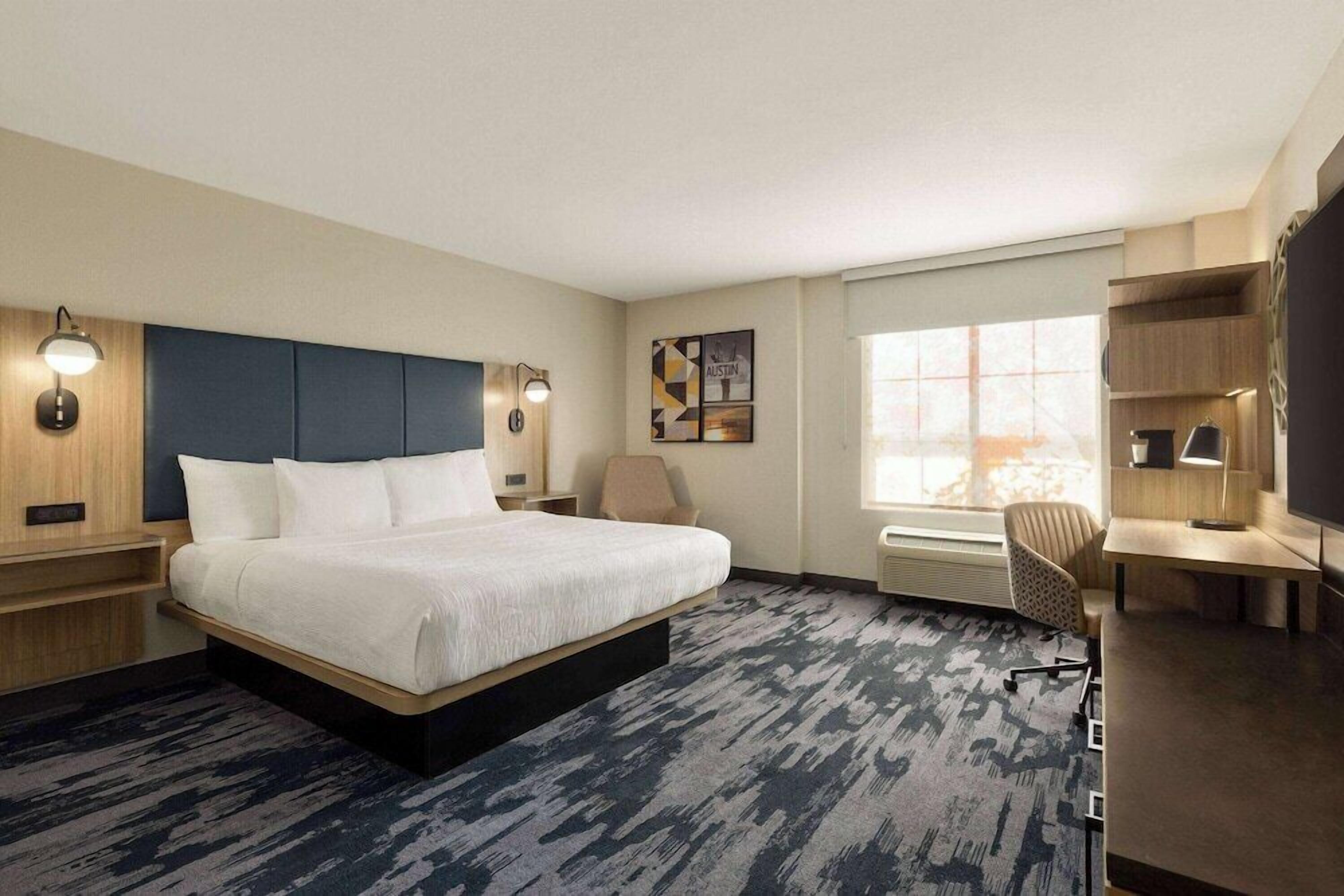 Pillow-top beds, desk, blackout curtains, iron/ironing board