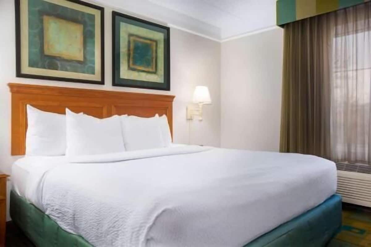 Pillow-top beds, desk, blackout curtains, iron/ironing board