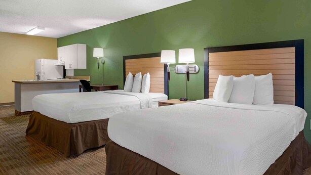 A hotel room with two beds, a desk, and a chair. - Extended Stay America Suites Houston Med Ctr Greenway Plaza (Houston)