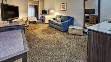 Room, 1 King Bed with Sofa bed, Non Smoking, Refrigerator & Microwave | Living area | 32-inch flat-screen TV with cable channels, TV