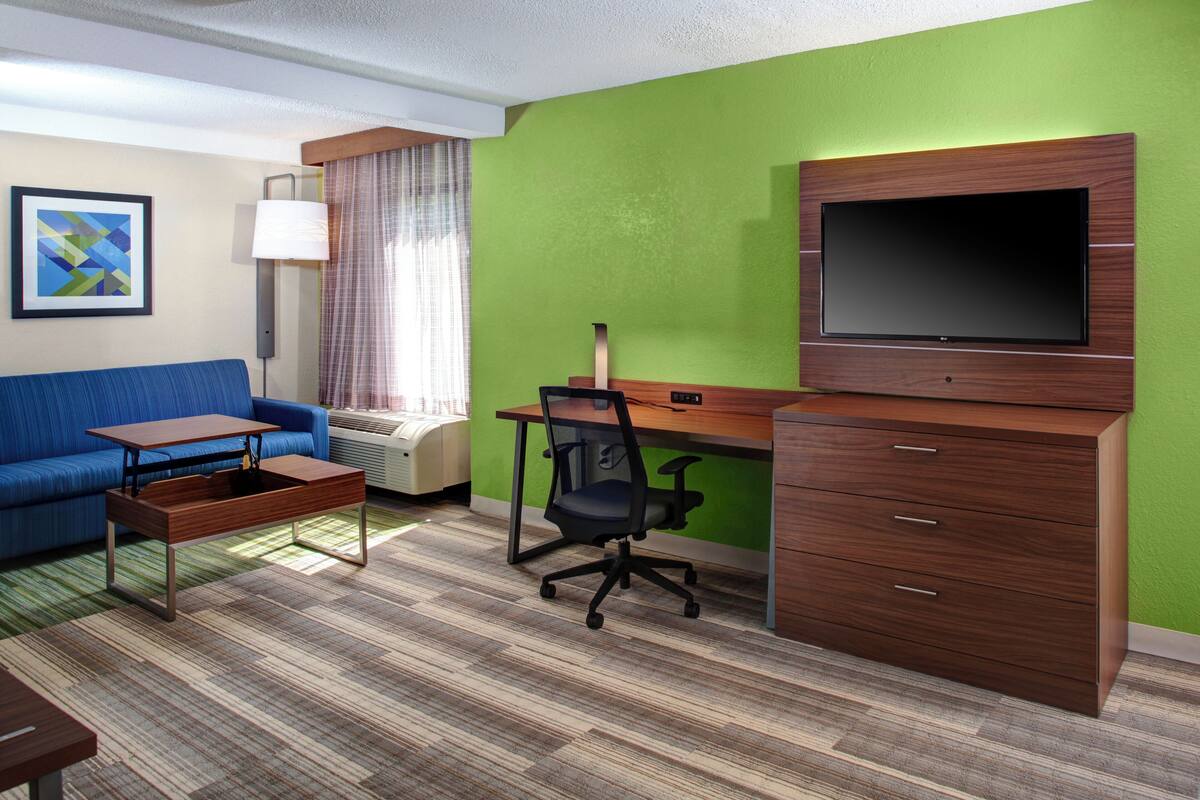 Suite, 1 Queen Bed with Sofa bed (Additional Living Area) | In-room safe, desk, iron/ironing board, cots/infant beds
