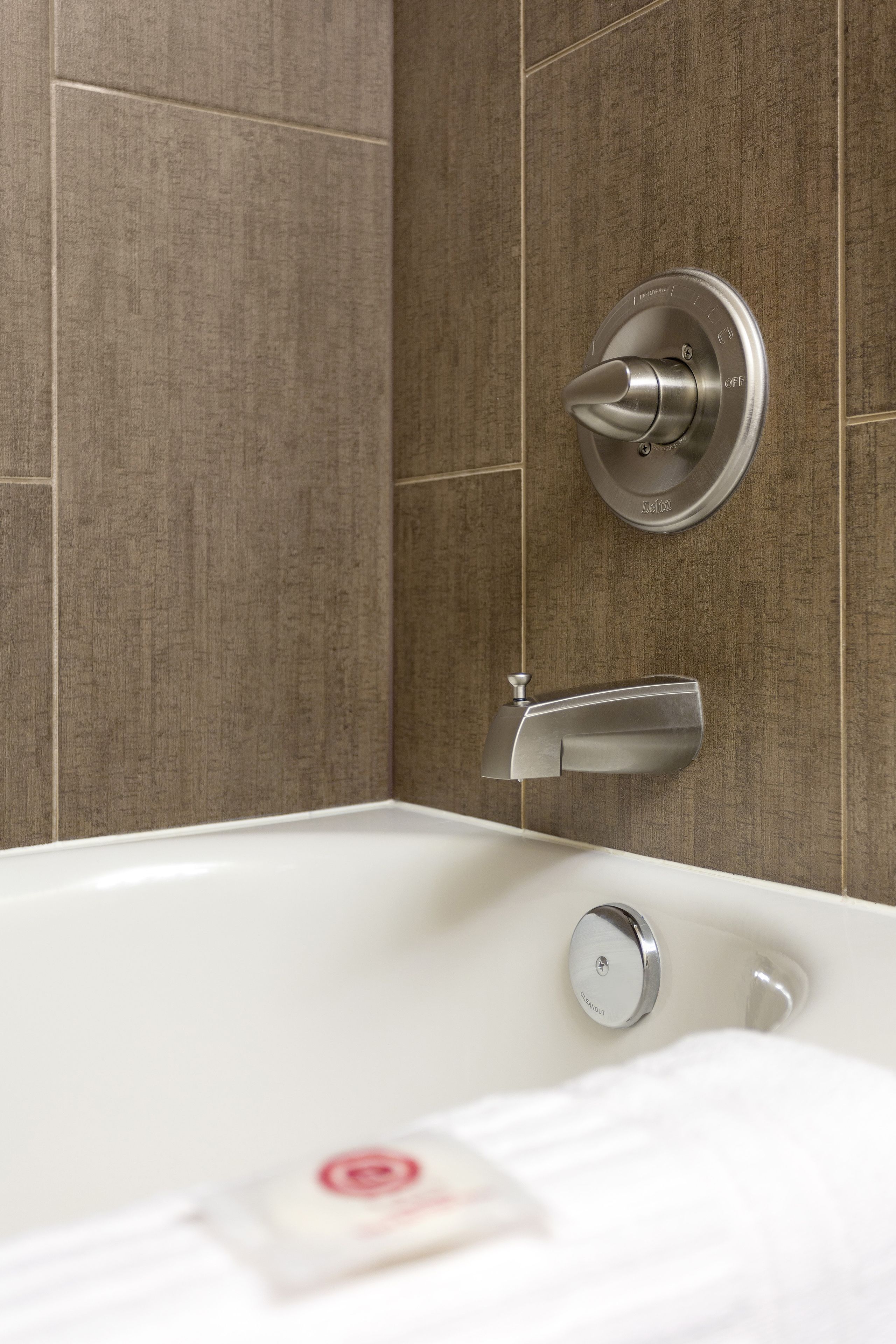 combined shower/bathtub, free toiletries, hair dryer, towels