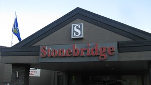 A building with a sign that reads "Stonebridge". - Stonebridge Hotel (Fort McMurray)