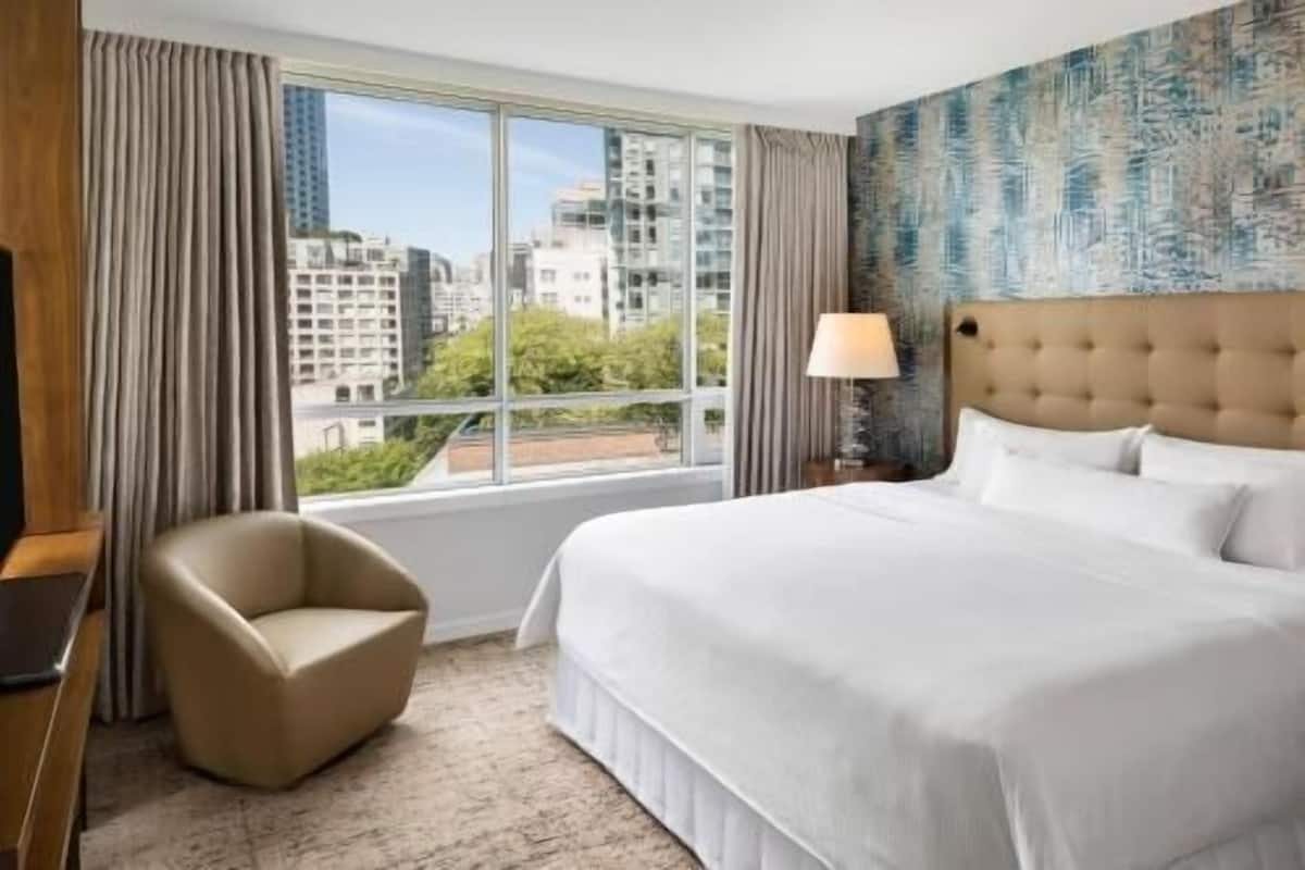 Premium bedding, down duvets, pillow-top beds, in-room safe