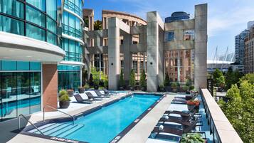 Outdoor pool, open 6:00 AM to 10:00 PM, sun loungers