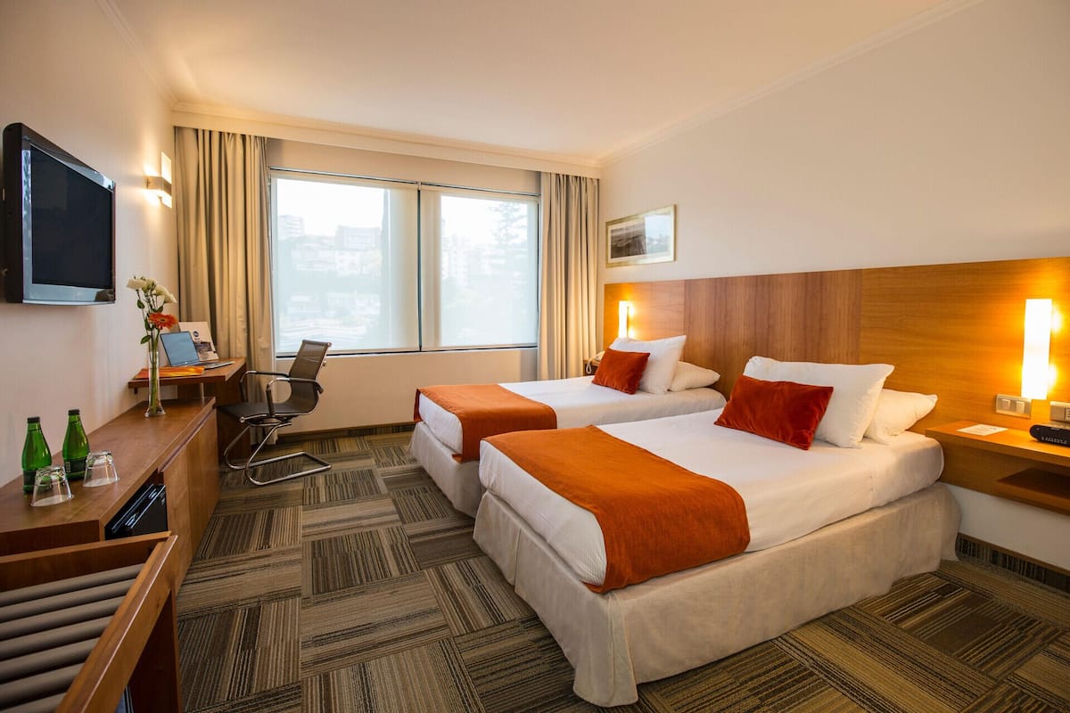 In-room safe, desk, WiFi (free), alarm clocks
