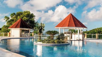 2 outdoor pools, pool umbrellas, pool loungers