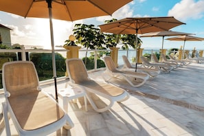 2 outdoor pools, pool umbrellas, sun loungers