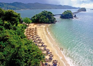 On the beach, sun-loungers, beach umbrellas