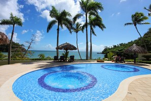 2 outdoor pools, pool umbrellas, pool loungers