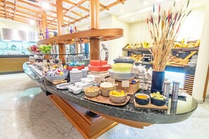 Daily buffet breakfast (USD 25.50 per person)