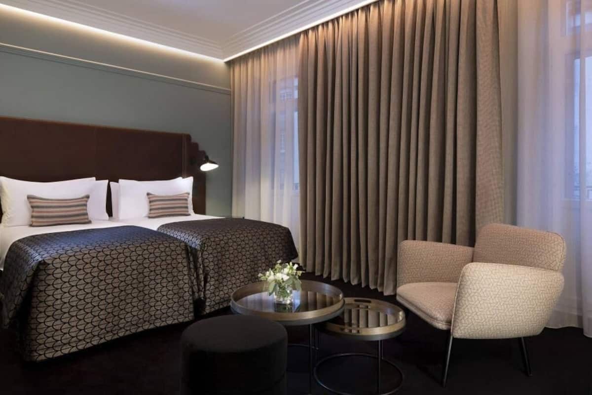 Minibar, in-room safe, individually decorated, desk