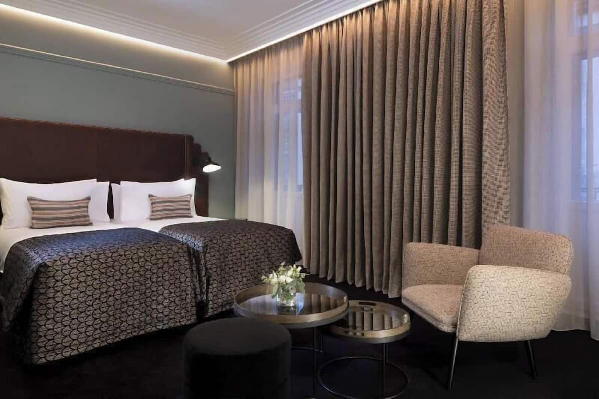 Minibar, in-room safe, individually decorated, desk