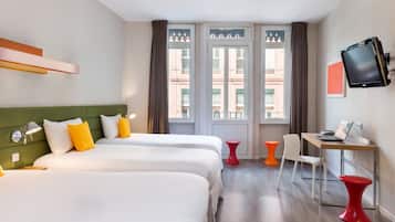 Premium bedding, Select Comfort beds, laptop workspace, blackout drapes