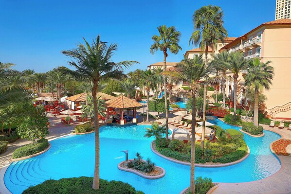 6 outdoor pools, open 9:00 AM to 6:30 PM, pool cabanas (surcharge)