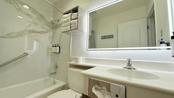 Combined shower/bathtub, hair dryer, towels