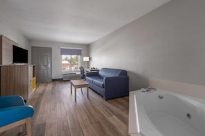 Deluxe Studio Suite, 1 King Bed, Non Smoking, Refrigerator | Jetted tub