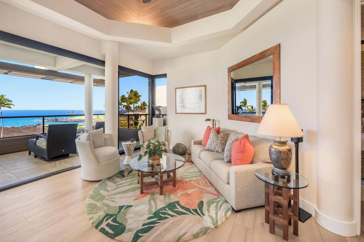 Condo (2 Bedrooms) | Living area | 40-inch TV with cable channels, DVD player