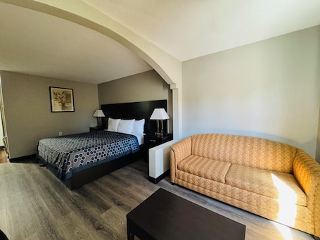 Quarto standard, 1 cama King, para não fumantes | Escrivaninha, cortinas blackout, ferros/tÔbuas de passar roupa