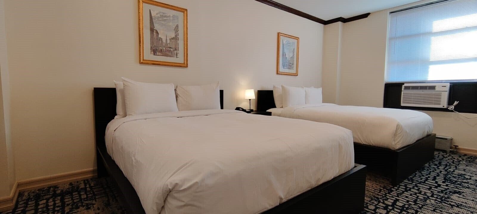 Gold, 2 Full Beds | Down comforters, in-room safe, individually decorated