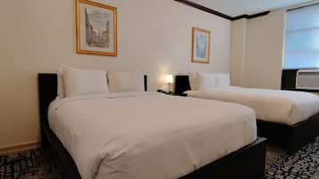 Gold, 2 Full Beds | Down comforters, in-room safe, individually decorated