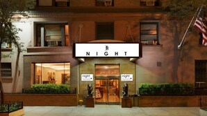 A hotel entrance with a sign reading "NIGHT" and "night hotels" on either side. - Night Hotel Broadway (New York)