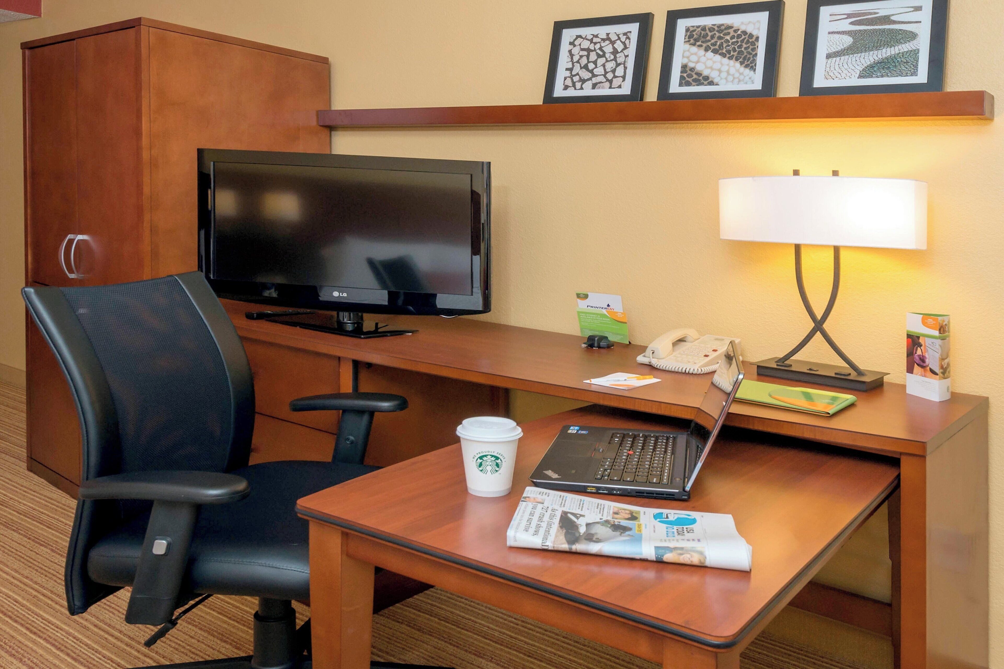 desk, blackout curtains, iron/ironing board, free cots/infant beds