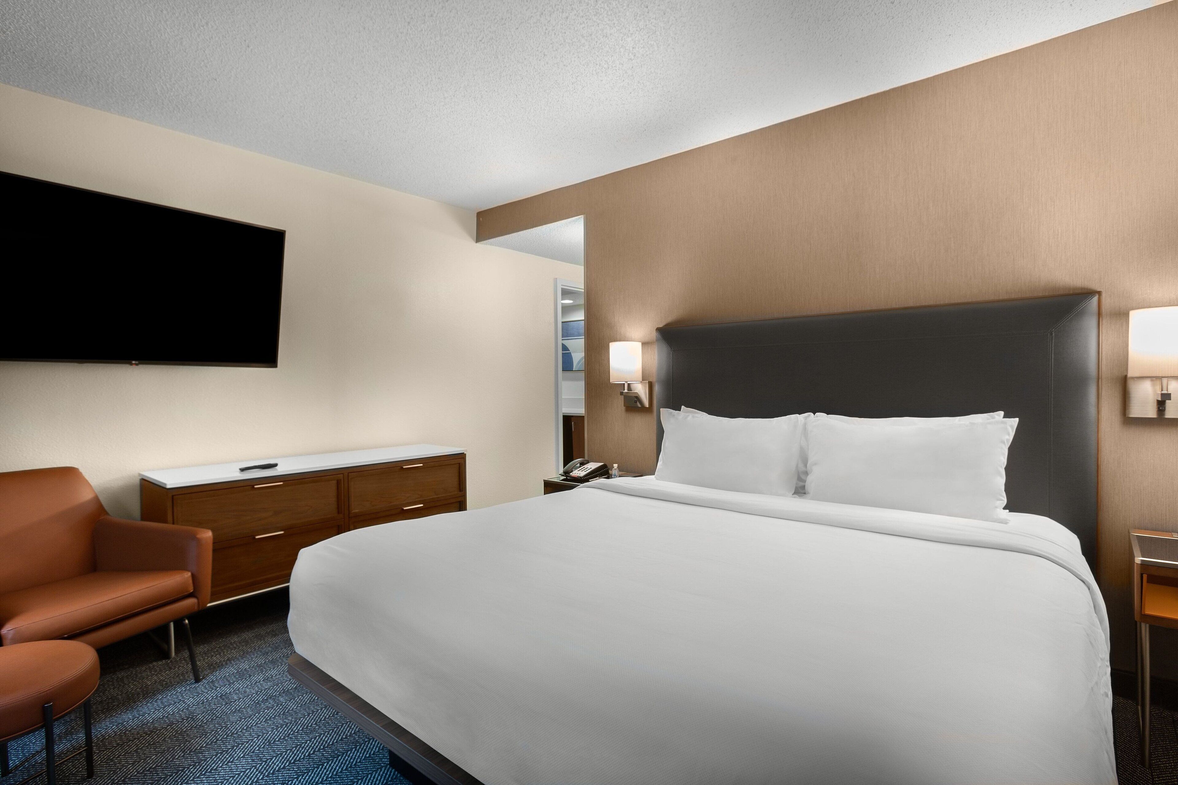 desk, blackout curtains, iron/ironing board, free cots/infant beds